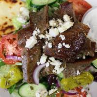 Gyro Salad · Gyro meat, romaine-iceberg lettuce, cucumber, tomato, red onion, kalamata olives, pepperonci...