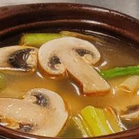 Tom Yum · Thai's favorite soup with mushrooms, green onions, lime juice, lemongrass, and Thai chili pa...