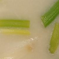Tom Kha Gai · Chicken in coconut milk, galangal, green onions, and lime juice.