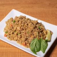 Kow Pad · Thai style fried rice with eggs, onions, peas, carrots and (chicken, beef, pork,  tofu, Shri...
