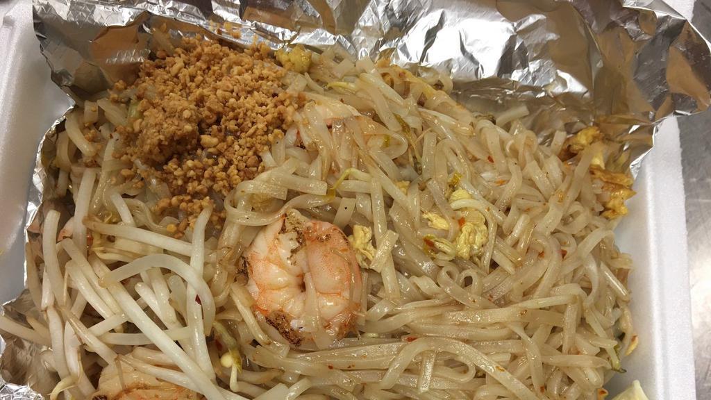 Pad Thai · Rice noodles sautéed with bean sprouts, eggs and green onions topped with crushed peanuts.