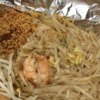 Pad Thai · Rice noodles sautéed with bean sprouts, eggs and green onions topped with crushed peanuts.
