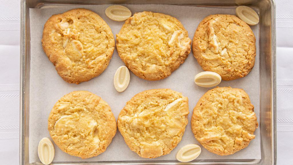 Lemon Cooler Cookie · Delicious all butter cookie made with coconut, white chocolate, and natural lemon flavor. Choose from 6,8, and 12 cookies per box.