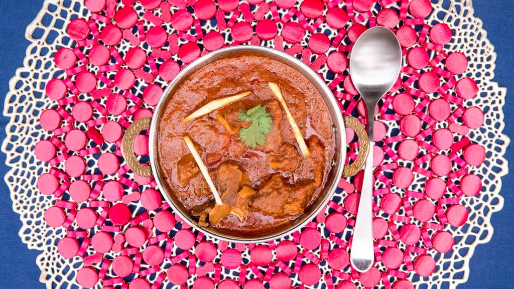 Goat Curry · Gluten-free. special Nepali entree goat meat on the bone cooked with gravy sauce and spices served with basmati rice.