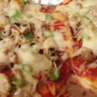 Flatbread Supreme O.G. · Mozzarella cheese, pepperoni, peppers, onion, mushrooms, homemade tomato sauce, and Kalamata...