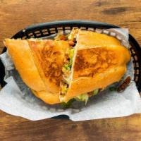 Tortas · Grilled artisan mexican telera bread with your favorite meat, pinto beans, mayonnaise, lettu...