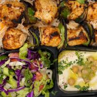 Chicken Kabab Plate · Our Chicken Kabab Plate comes with 2 skewers of Chicken Kababs served with rice, hummus, sal...