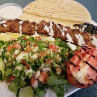 Chicken Seekh Kabab Plate · Ground chicken meat mixed with spices and skewered on a grill