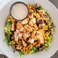 Southwest Salad · Mixed greens, tomato, roasted corn, red peppers, black beans and shredded cheddar with black...