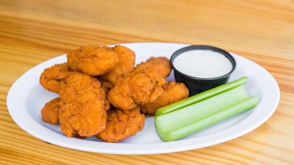 Boneless Wing · Popular. Boneless chicken breast breaded and deep fried to crisp and juicy perfection. Served with celery and blue cheese or ranch dressing. Try them tossed in your favorite lizard sauce.