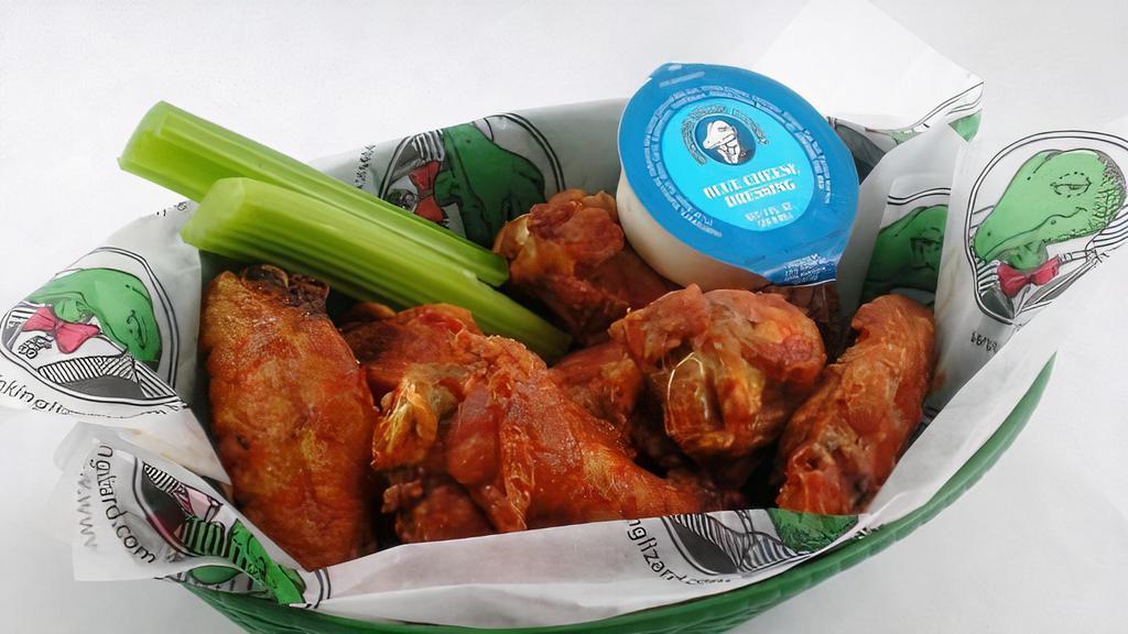 Traditional Wings · Popular. House specialty! We use only the freshest jumbo wings, never frozen! Served with celery and bleu cheese or ranch dressing.
