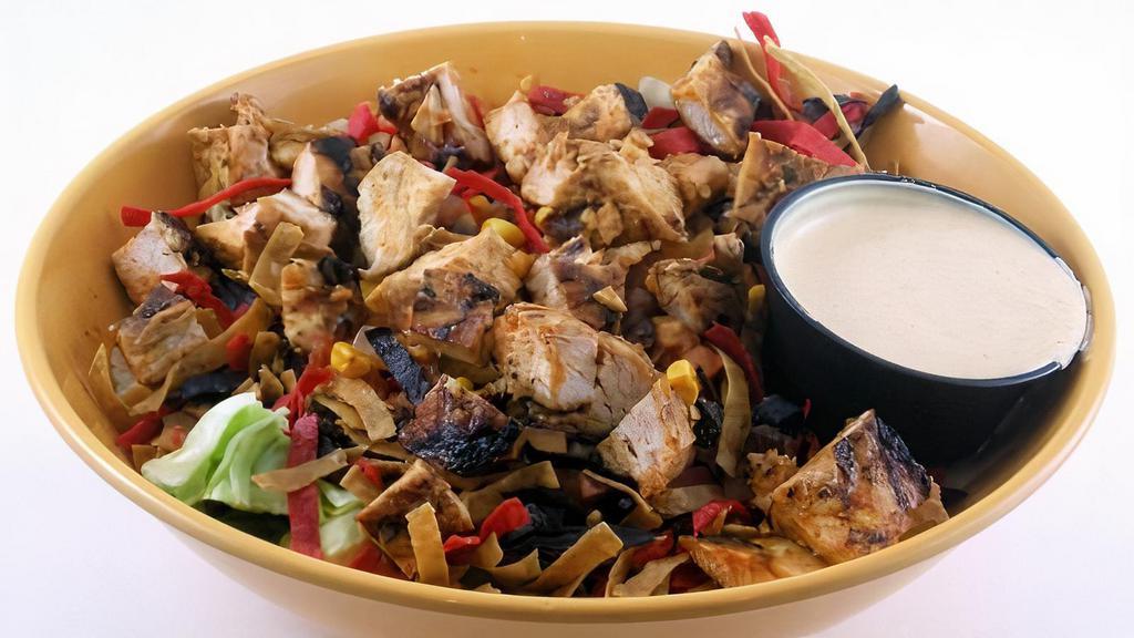 Mesa Chop Chicken Salad · A Santa Fe seasoned chicken breast on a bed of mixed greens topped with black bean and fire roasted corn salsa, mozzarella cheese, cheddar cheese, and crispy tortilla strips. Served with a Southwestern ranch dressing.