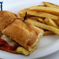 Bo-Man'S Chicken Parmesan · Fresh chicken breast, lightly breaded with Italian bread crumbs, smothered in marinara sauce...