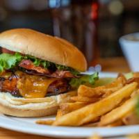 Bbq Chicken Club · A grilled chicken breast basted in our award winning BBQ sauce, topped with cheddar cheese, ...