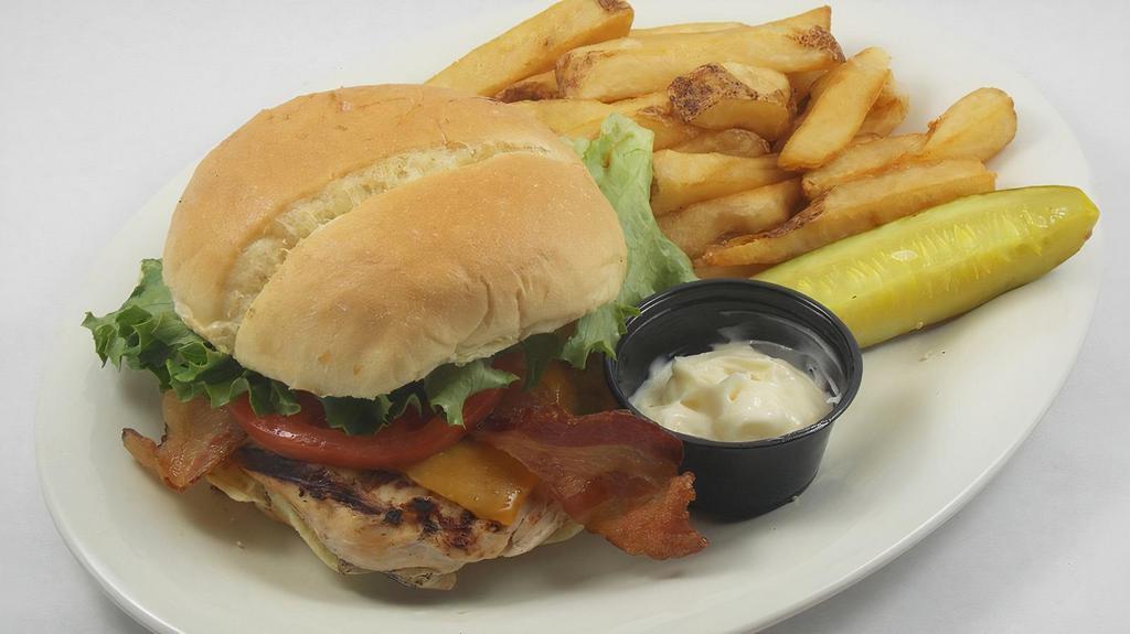 Cheddar Club · A grilled chicken breast topped with cheddar cheese, applewood bacon, lettuce, tomato and a side of mayo. Served on a deluxe roll.