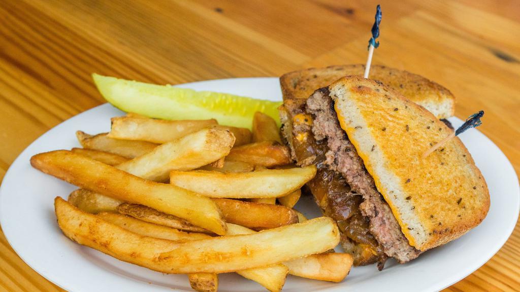 Patty Melt · Charbroiled ground beef patty with American cheese and grilled onions. Served on grilled rye bread.