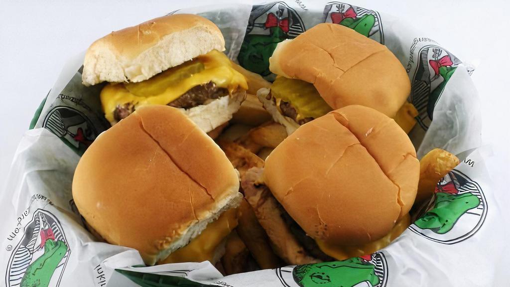 Mini Burger Basket · Popular. Four slider burgers served on rolls with American cheese and pickle chips.