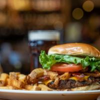 Wild Western Burger · Based in our award winning BBQ sauce, topped with American cheese, applewood bacon, lettuce,...