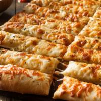 Cheese Bread · Freshly baked 16 pieces garlic cheese bread topped with mozzarella cheese and Romano cheese.