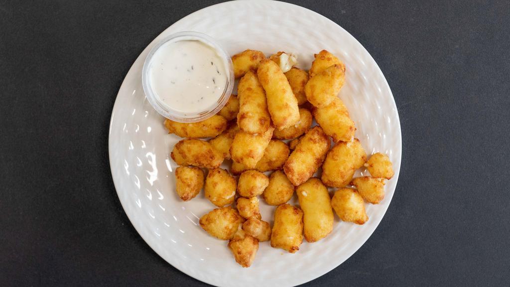 Cheese Curds · 6 oz of Heavenly battered and deep fried  White Cheddar Cheese bites.