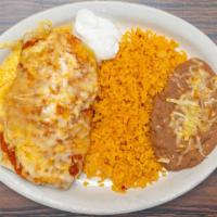 Burrito Suizo Dinner · Contains beans, lettuce, tomato, cheese, onions, cilnatro and sour cream. Served with ranche...