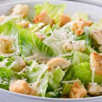 Caesar Salad · Romaine lettuce, asiago, Caesar dressing and Parmesan croutons.