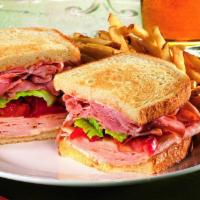 Italian Club Sandwich · Oliveto Italian Bistro favorite: Smoked turkey and ham with provolone cheese, lettuce, tomat...