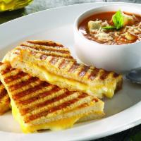 4 Cheese Grilled Cheese · A classic grilled cheese sandwich made with four cheeses.