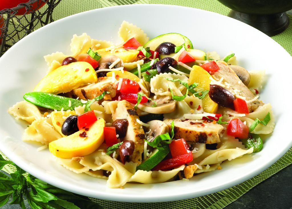 Chicken Primavera · Sliced chicken, zucchini, yellow squash, red peppers, tomatoes, mushrooms, onions, kalamata olives, garlic, red pepper flakes, fresh basil, asiago cheese and lemon garlic butter with bowtie pasta.