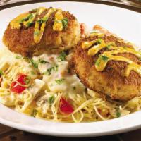 Crab Cake Italiano · Angel hair pasta tossed with lemon garlic butter, asiago cheese, tomatoes and mushrooms, cov...