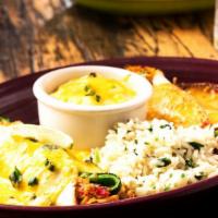 Enchiladas San Carlos · Two Pulled Chicken Enchiladas made with flour tortillas, one covered with Poblano Cream sauc...