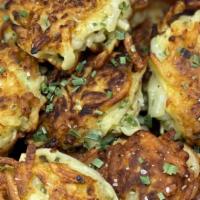 Latkes · Fried to order. These potato pancakes come with apple sauce for dipping!