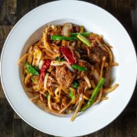 Mongolian Delight · Chicken, Beef  Shrimp and onion with Mongolian sauce