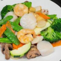 Seafood Delight · With Jumbo shrimp, scallop, crab stick, calamari and mix  vegetable.