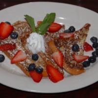 French Toast · Served as a sweete dish,Milk, sugar, vanilla, cinnamon pan-fried topped with powder sugar, b...