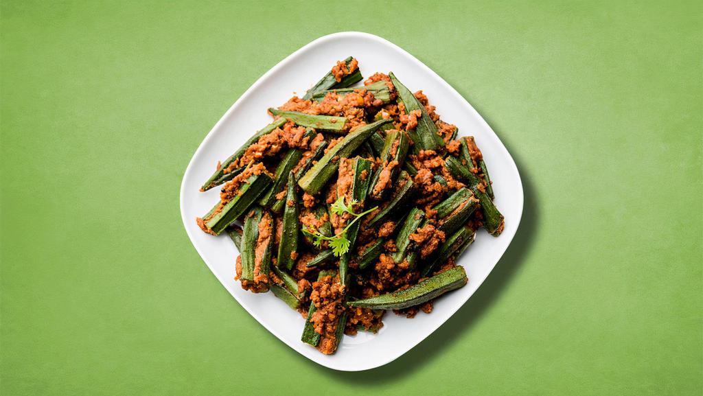 Spicy Masala Okra  · Diced fresh okra, sautéed with onions, garlic and spices till crisp then cooked in tomato and onion gravy.