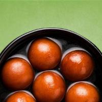 Divine Dumpling Discovery · Soft delicious berry sized balls made of milk solids, flour & a leavening agent.