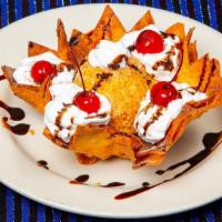 Fried Ice Cream · Deep fried vanilla flavor ice cream covered with caramelized sugar and cinnamon, top with wi...