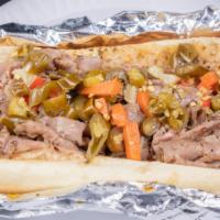 Italian Beef Sandwich · 1/2 lb of meat lightly dipped in our homemade aujus on french bread.