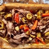 Combo Sandwich · A mixed combo of Italian beef and Italian sausage lightly dipped in aujus.