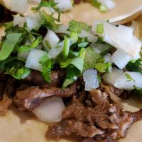 Pollo Asado Taco · All tacos are served on fresh soft corn tortillas, garnished with fresh chopped cilantro, on...