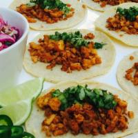 Chorizo Taco · All tacos are served on fresh soft corn tortillas, garnished with fresh chopped cilantro, on...