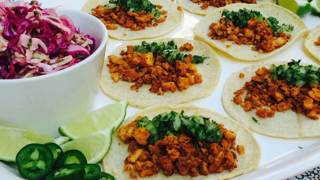 Chorizo Taco · All tacos are served on fresh soft corn tortillas, garnished with fresh chopped cilantro, onions, and limes.