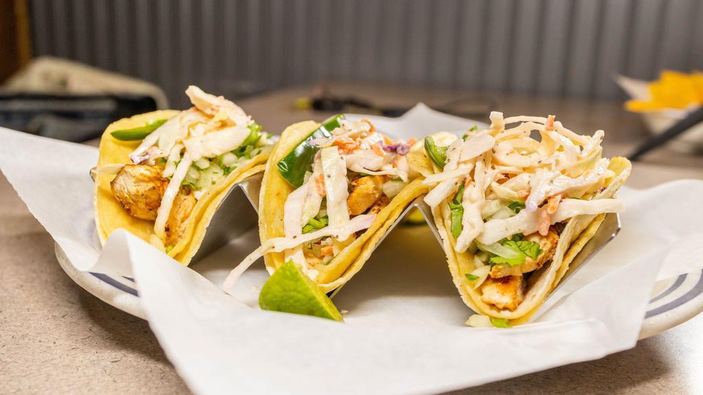 Street Tacos (Fish) (3) · Served on corn tortillas with coleslaw, cilantro, cheese and homemade salsa.