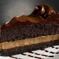 Khan'S Cake · Layers of chocolate topped with more chocolate.