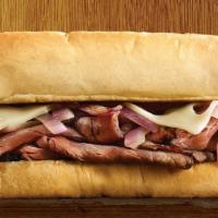 French Dip · Warm, sliced roast beef, swiss cheese, and grilled onions on a grilled hoagie with au jus fo...