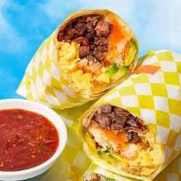 Breakfast Burrito · Eggs, melted cheese, caramelized onions, avocado.