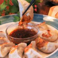 Fried Dumplings (6) · (owner homemade) Served with a delightful dumpling sauce.