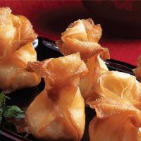 Shrimp Purse (6) · Fried wontons stuffed with shrimp and onions.