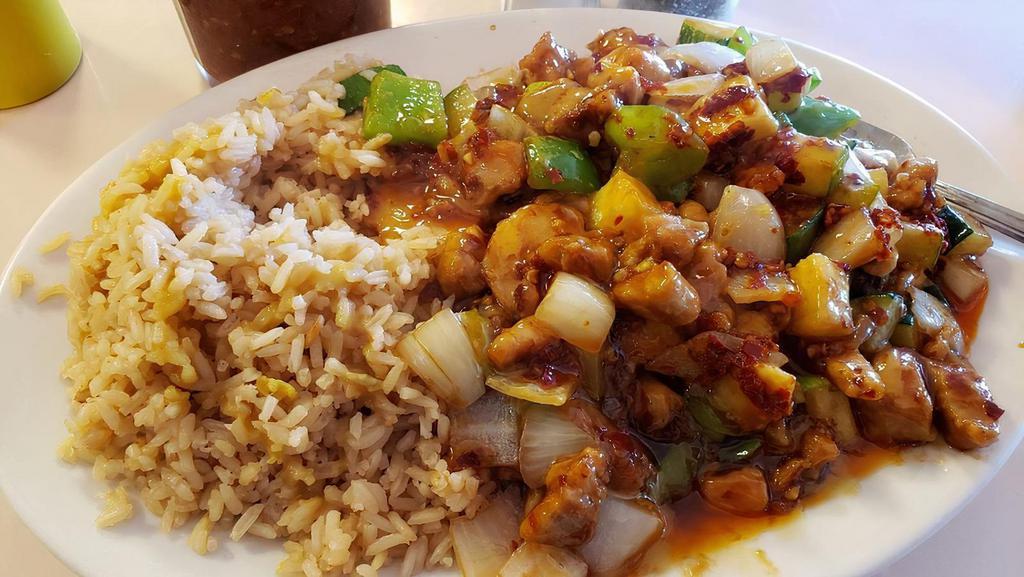 Kung Pao Chicken · Spicy. Includes diced celery, carrots, water chestnuts, roasted peanuts, and dried red peppers, stir-fried in our spicy brown sauce.